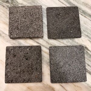CB2 set of Four Lava Stone Coasters